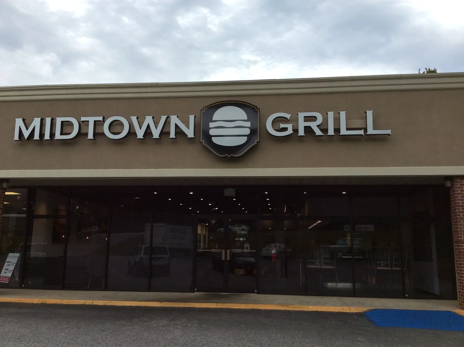 Midtown Grill signage on the wall